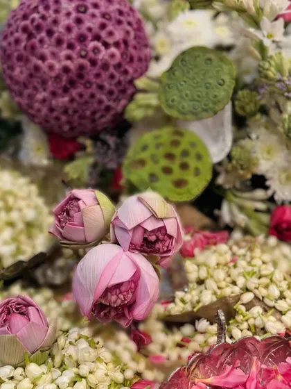 A close-up of my favorite traditional flowers for Diwali. The delicate pink lotus buds nestled among fragrant white mogra and lotus pods create a display that is both beautiful and deeply symbolic.
