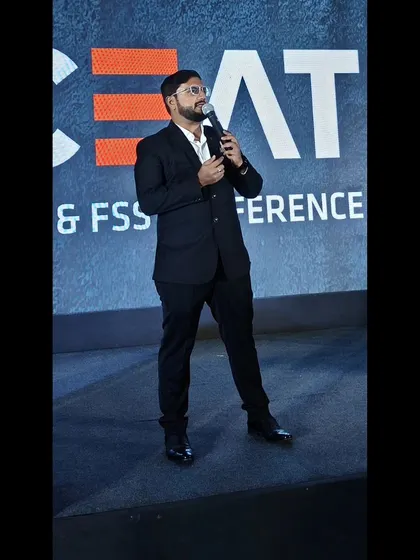 A candid shot from a corporate conference. Even during serious events, I find moments to connect with the audience and keep the energy flowing.
