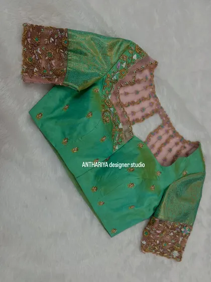 The full view of this unique and stylishly designed blouse.