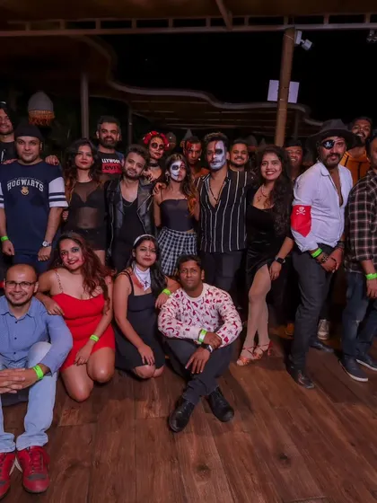 The whole crew together. A group photo from our Halloween Party '23, capturing the fun costumes and amazing community spirit.