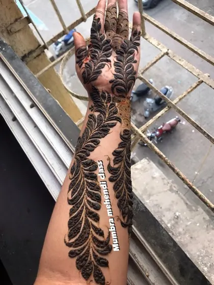 A full arm design featuring bold, shaded leaves. This is a classic Gulf style that is always in demand.
