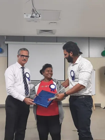 Receiving recognition for my participation in the health and fitness orientation program. It's rewarding to contribute to the community and share my expertise.