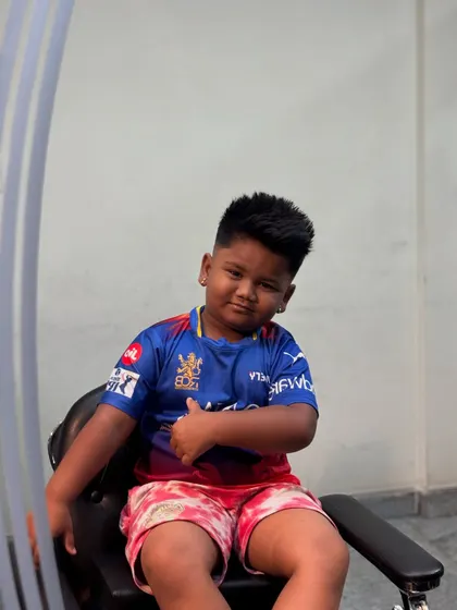 Arya showing off his new haircut. It's all about making them feel cool and confident.