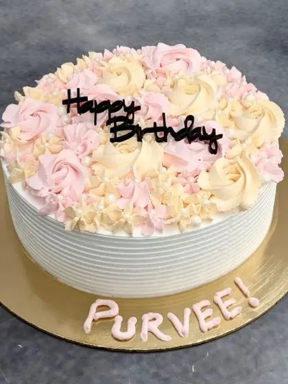 Starting the week sweet with this simple yet stunning pink and yellow cream cake. The floral piping on top adds a beautiful, soft touch.