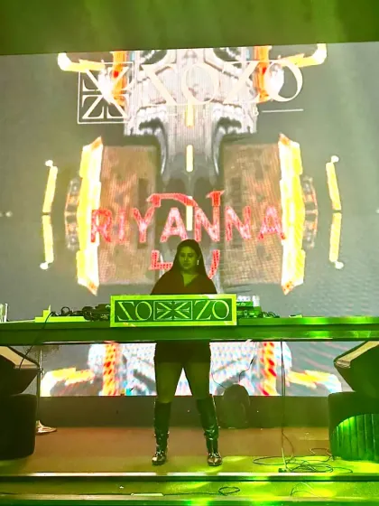Standing tall behind the decks at Xozo, with my name lit up on the giant screen. This was a night of powerful beats and even more powerful visuals.