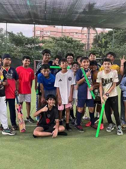 All smiles after a great game! This group of older kids had a blast with our cricket and football party package.
