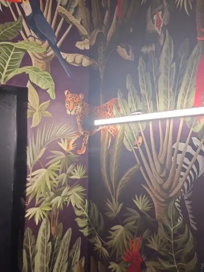 Another section of the dark jungle wallpaper.