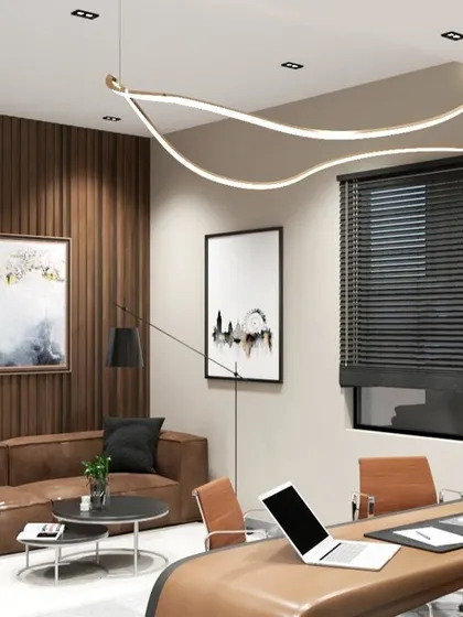 Another view of the executive cabin concept, this time highlighting the informal seating area. A comfortable leather sofa against a wood-paneled wall provides a space for relaxed discussions, demonstrating our focus on multi functional office design.