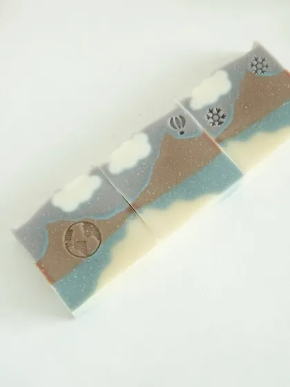 A lineup of 'Mountain Mist' bars, creating a continuous landscape.