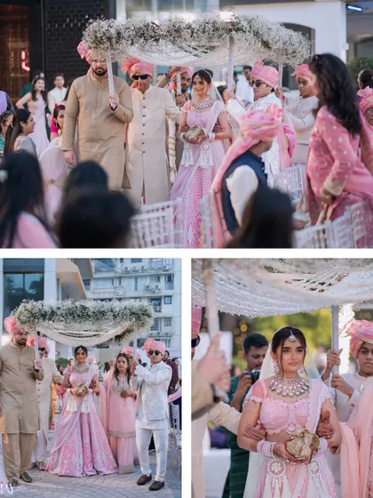 The bride makes her grand entrance under a beautiful floral 'phoolon ki chadar' at her beach wedding.