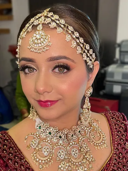 This shot highlights the glowing skin and the perfectly matched lip color. I help brides choose shades that complement their skin tone and outfit.