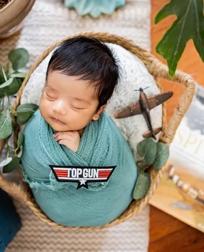 When dad's a pilot, we have to do a Top Gun theme. I love incorporating personal touches and hobbies into my newborn sessions to make them extra special for your family.