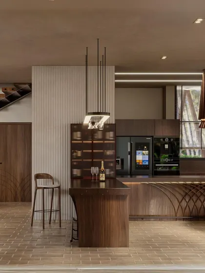 This render shows the kitchen and bar area of the Siori Lilly Villas. The design uses a rich walnut wood and a curved bar with intricate detailing, creating a sophisticated space for entertaining.