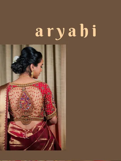Presenting the 'Aryahi' blouse, a signature piece where traditional artistry meets sophisticated design. The elaborate back features a central embroidered motif with elegant bead chains, creating a truly unforgettable bridal statement.
