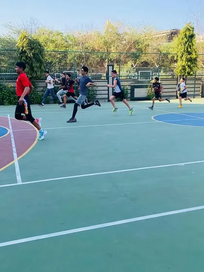 A player leads the pack during a running drill, pushing the pace for the team.