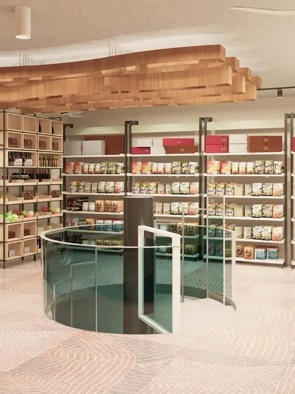 A look at the upper level of the retail space, accessible via the glass-paneled spiral staircase. This area features different flooring and shelving styles, creating a new zone for customers to explore.