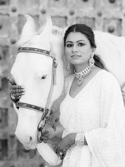 She went on a white horse to meet her prince. I love flipping traditions to create powerful and unique moments, like this stunning reverse-baraat bridal entry.