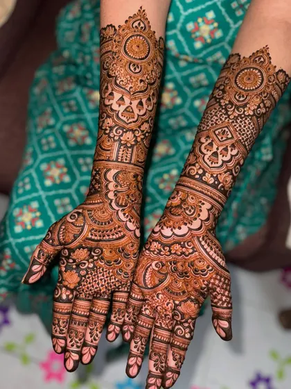 Another view of a stunningly intricate engagement design, filled with dense, traditional patterns.