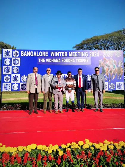 The presentation ceremony for The Vidhana Soudha Trophy with the winning team of English Bay.