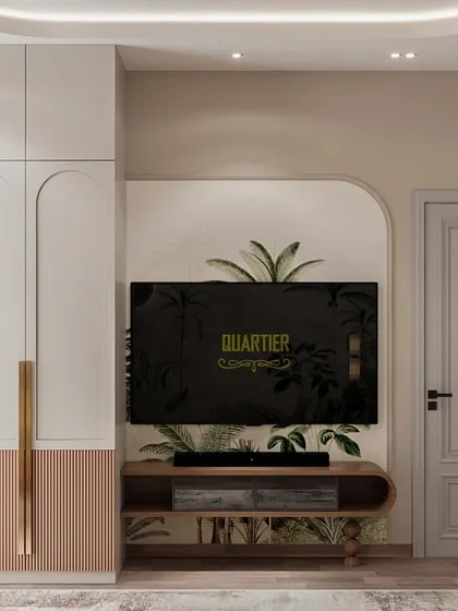 The TV unit and wardrobe design for the Cleo County guest bedroom. I used arched details and a two-tone finish on the wardrobe to add a touch of playful elegance, ensuring even guest spaces feel special.