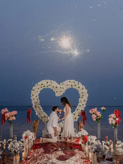 The perfect surprise proposal, complete with fireworks and a heart of flowers on the water. I specialize in capturing these once in a lifetime moments, ensuring the surprise, joy, and romantic setup are remembered forever.