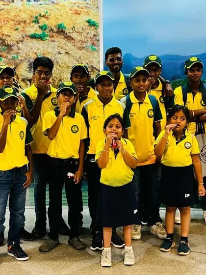 The team enjoys a visit to a local attraction during their Sri Lanka tour.