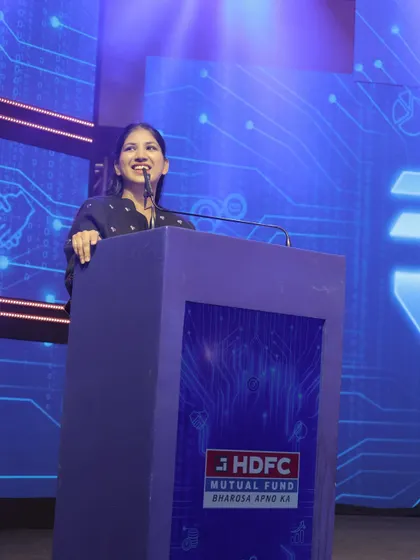 Speaking from the lectern at the HDFC Mutual Fund conference. The setup included a large LED screen for which I provided seamless live commentary and introductions.
