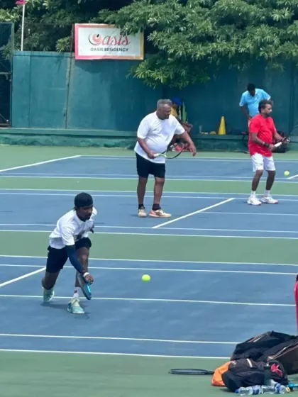 A glimpse into a competitive doubles match featuring our coaches and senior players. This is where high-level strategy and skills are honed.