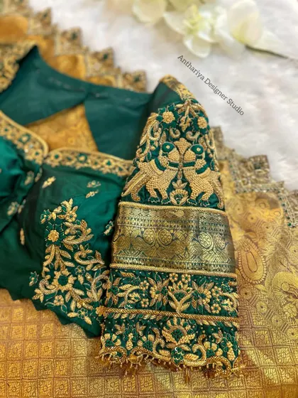 Another angle of the sleeve, highlighting the beautiful peacock embroidery.