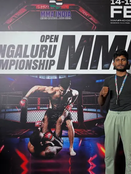 Suhas posing after winning a silver medal at the 7th Open Bengaluru MMA Championship. A minor setback on an exciting journey, we are already working to come back stronger.