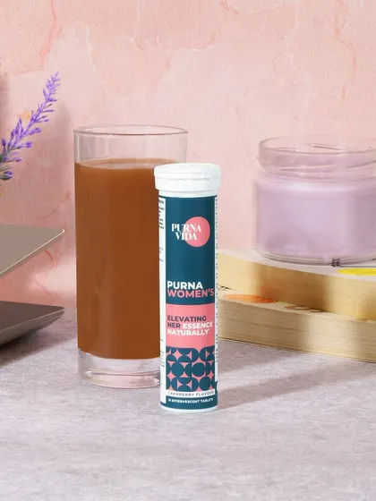 A duplicate of image 138, showing a cozy lifestyle setting for a women's wellness supplement. The context suggests it's a product for relaxation and self care.