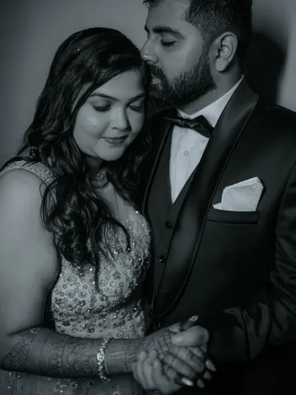 Sometimes, the most powerful stories are told without color. This black and white portrait focuses on the pure emotion, the gentle touch, and the quiet promise between two people, creating a classic, timeless piece of art.