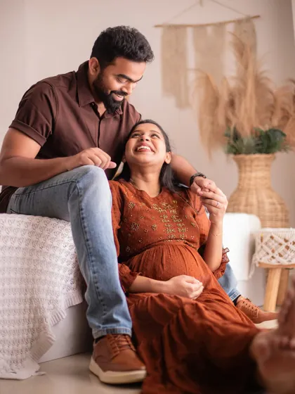 A moment of shared laughter. Our goal is to make you feel so comfortable that you forget you're even at a photoshoot.