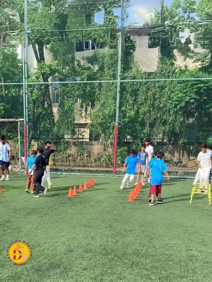 Players navigate an obstacle course during our fitness program. These drills are designed to improve agility, coordination, and overall athletic performance.