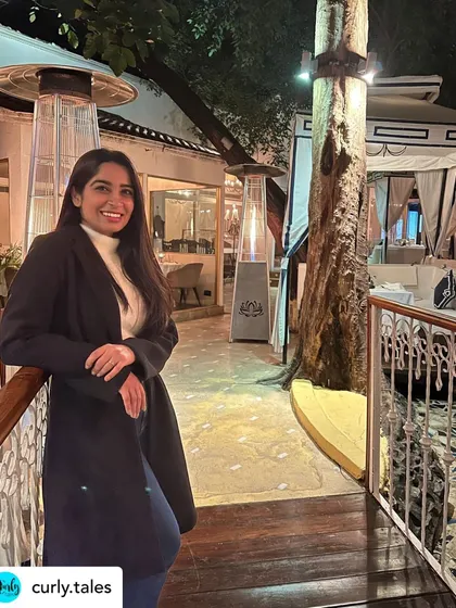A guest enjoying the ambiance of our outdoor terrace. We love seeing our patrons feel at home in the space we have created.