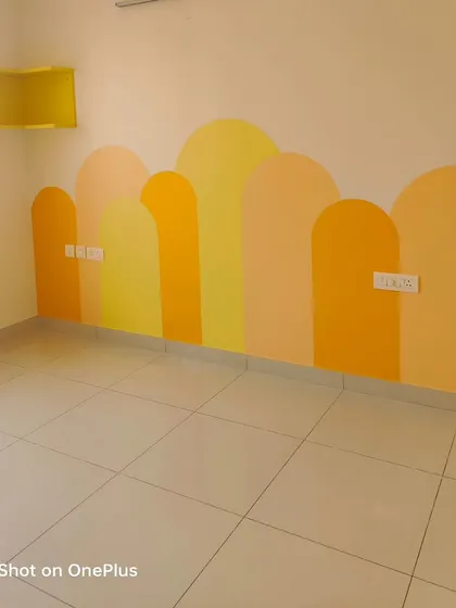 The mural provides a perfect, colorful backdrop for a child's room.