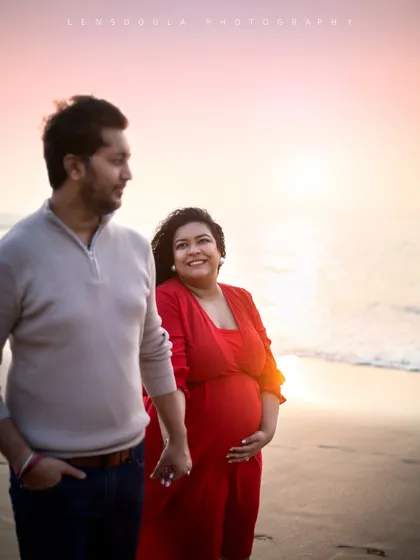 A quiet walk along the shoreline at dusk. The soft, fading light and serene environment make for incredibly romantic and peaceful maternity portraits.