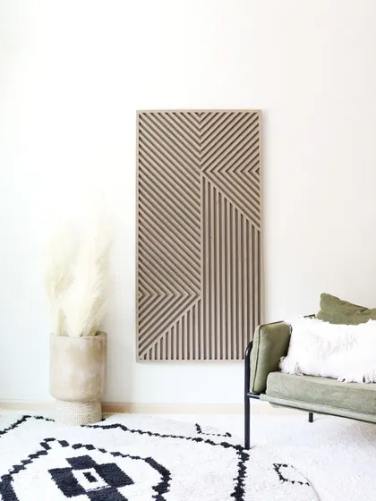 Our 'Ethnic Mirage' wood art, shown here as a vertical panel. Its intricate line work adds a sophisticated, global-inspired touch to this bohemian-style room.