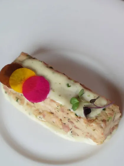 A close-up of the Malai Chicken Terrine, a sophisticated and flavourful starter from our exclusive Christmas menu.
