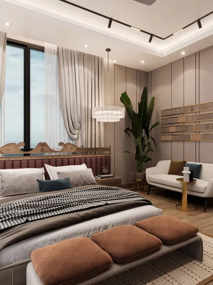 A render of a bedroom at Amaryllis, Karol Bagh, where elegance meets tranquility. The design features a unique carved headboard, a layered houndstooth throw, and a comfortable seating nook.