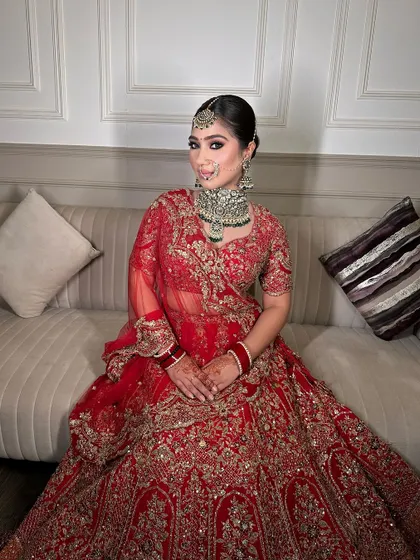 A full-length shot of our glowing bride, showcasing how our jewellery completes her entire wedding ensemble from head to toe.