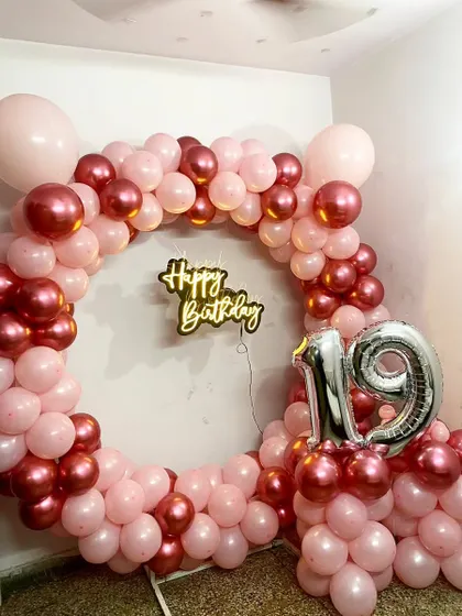 This circular balloon frame is a popular choice for creating a dedicated photo spot at any party.