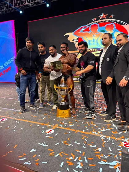 On stage with my student Bharat after his overall championship win. This is the ultimate goal of our coaching.
