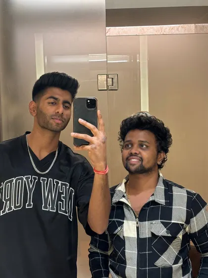 A smiling selfie with Mayank Yadav.