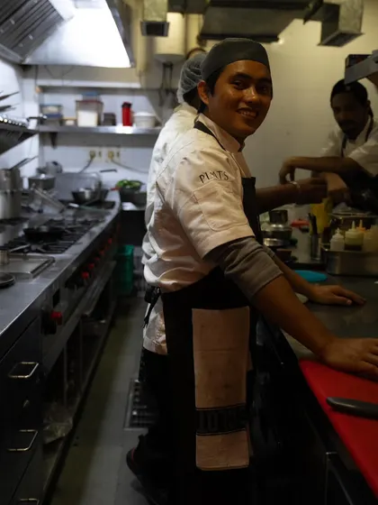 A smile from the heart of our kitchen. Our team is the driving force behind every dish we serve.
