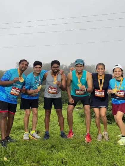The team celebrating after a successful and muddy Lonavla Varsha Run. Everyone who showed up and pushed through the hills and rain is a winner in our book.