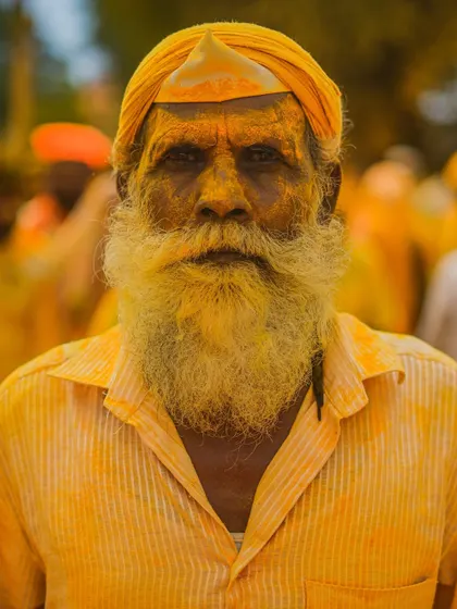 A series of striking portraits from the Pattan Kodoli festival. Each face tells a story, covered in the golden 'Bhandara' powder, reflecting deep faith and tradition.