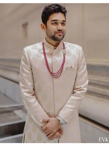 A handsome portrait of the groom-to-be, Madhusudhan, looking sharp in his traditional engagement attire.