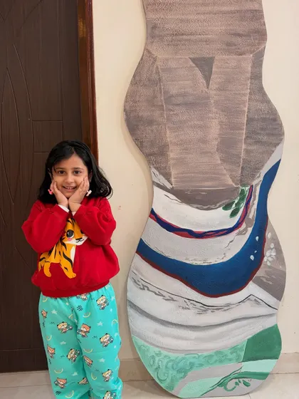 This custom 6ft tall abstract artwork was designed for a residence in Mumbai. The unique, curved shape and flowing design make it a one-of-a-kind statement piece.