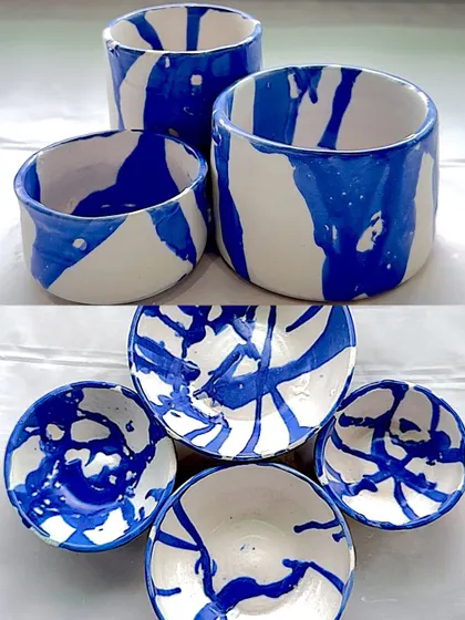 I love the contrast of the deep blue against the white clay. Each of these handmade bowls has its own unique pattern, a small universe of splashes and drips.